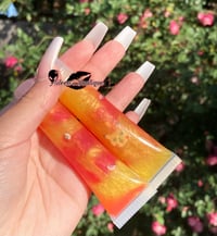 Image 1 of Pikachu gloss 