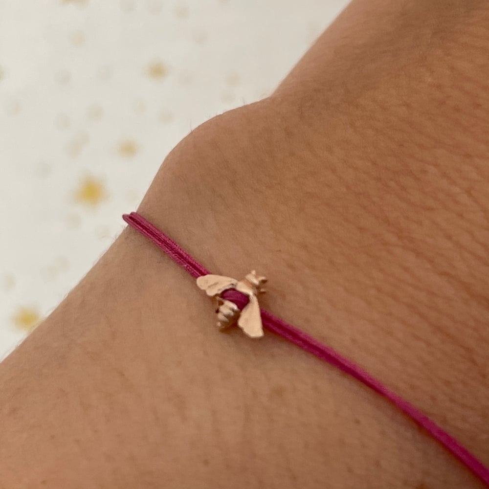 Image of gold bee bracelet