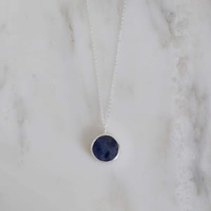 Image of Sodalite flat round cut silver necklace
