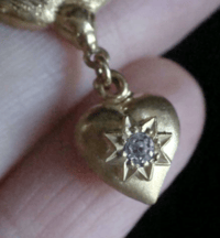 Image 5 of Edwardian 18ct diamond swallow heart necklace
