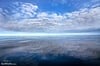 Clouds Reflected at Sea