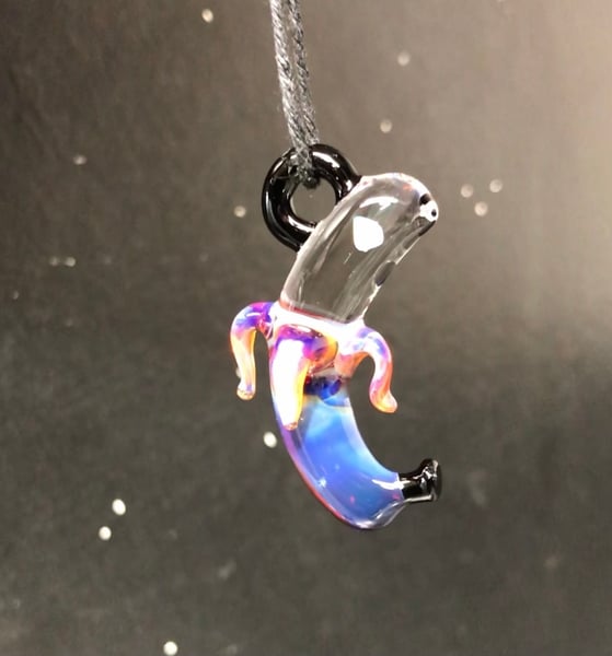 Image of Amber purple banana pendant 
