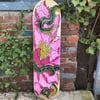 Skateboard pivoine et serpent