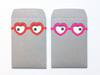 2 x the villa envelope and its heart glasses