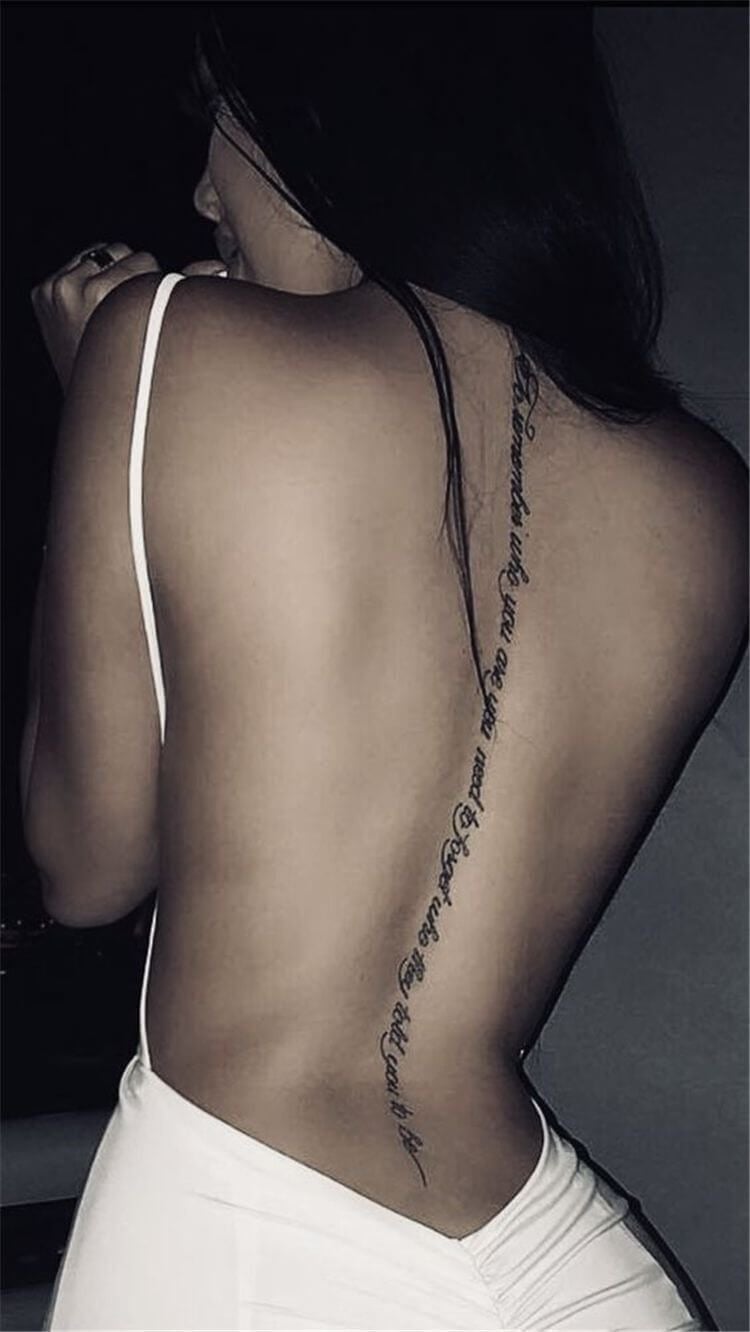 spine tattoos writing