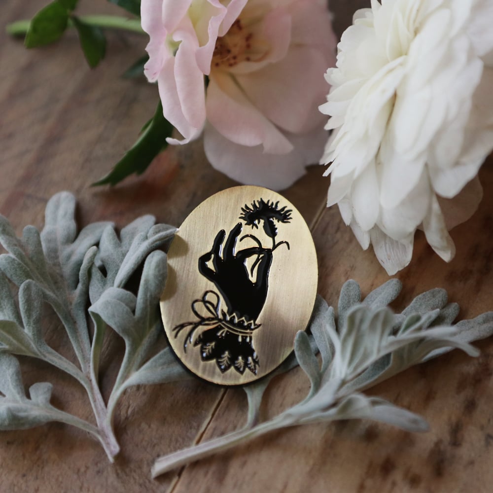 Image of A Flower in Hand Enamel Pin