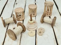 Image 1 of Wooden   bobbins brown