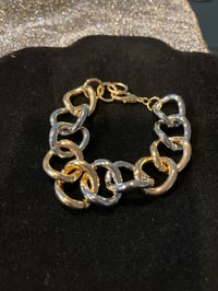 Gold and silver link bracelet 