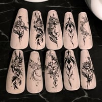 white and black floral nails