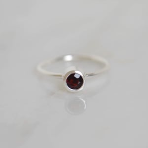 Image of Wine Red Garnet round cut classic silver ring 
