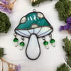 Teal Tumbling Toadstools Suncatcher