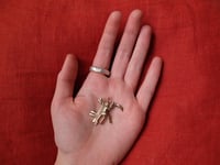 Image 2 of CARRYING THE CREATURE