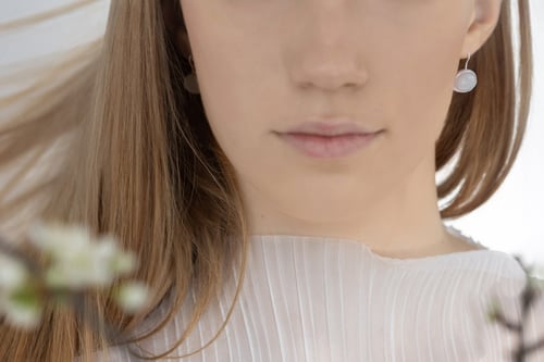 Image of "Happy sign" silver earrings with moonstone · OMEN FAUSTUM ·