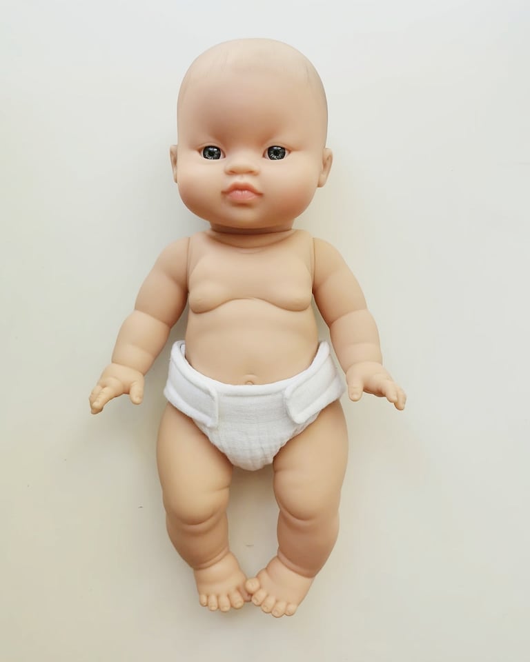 Poupon garçon Asie +couche