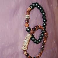 Mens red tigers eye protection set