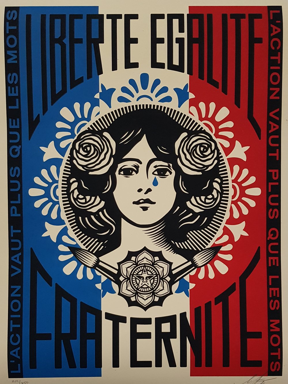 Image of SHEPARD FAIREY "L`ACTION VAUT PLUS QUE LES MOTS" - SIGNED AND NUMBERED EDITION OF 650