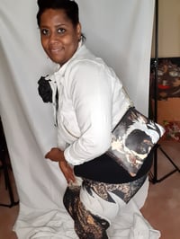 Image 2 of The Box, “Encased in Light”, clothes and bag