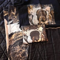 Image 3 of The Box, “Encased in Light”, clothes and bag