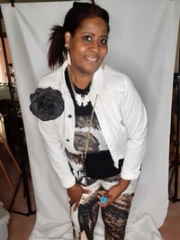 Image 4 of The Box, “Encased in Light”, clothes and bag