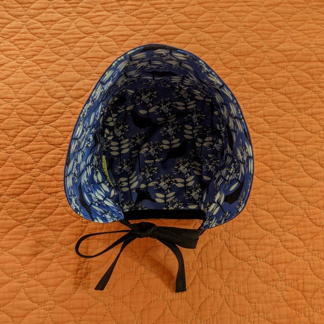 Image of Reversible Sun Bonnet - Bowerbird