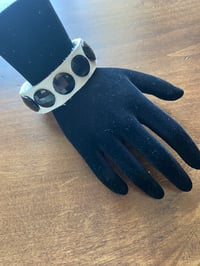 Image 2 of Black and white leather bracelet