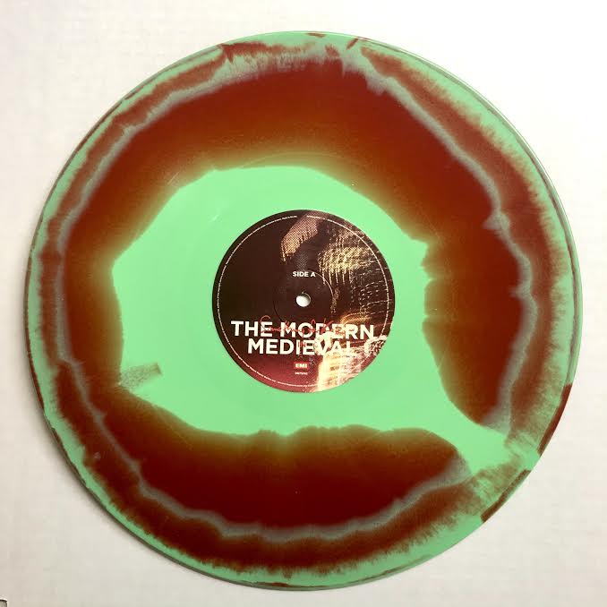 Image of 'The Modern Medieval' mint green & red vinyl - very limited edition signed