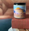 “Big Stacks” Soy Candle featuring art by Sarah Spillers 