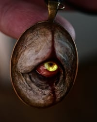 Image 5 of Pennywise Eye glow in the dark pendant OOAK