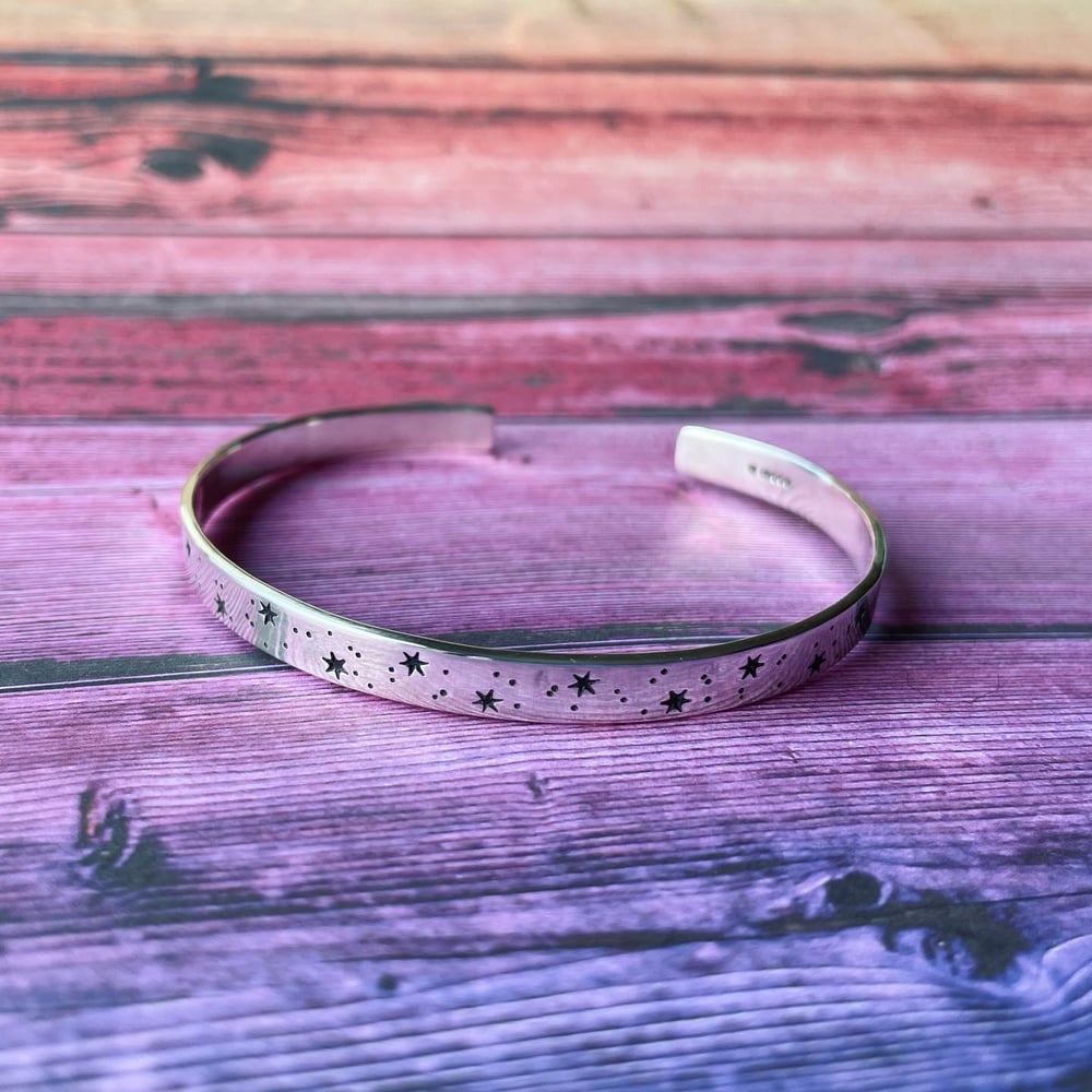 Image of Stars and dots stamped Sterling silver cuff bracelet. Celestial silver star bangle. Cosmic stars.