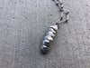 Kinetic Pill Bug necklace