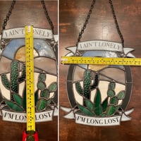 Image 5 of I Ain’t Lonely Suncatcher