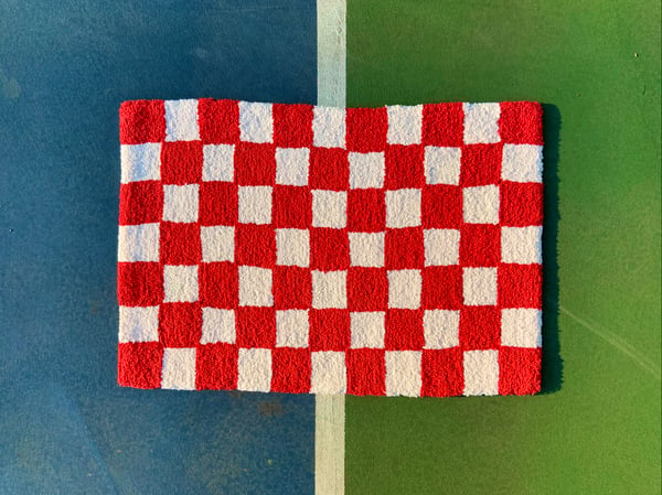 Image of Red and Cream Checkered Rug