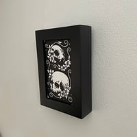 Image 2 of Human And Cat Skull Linocut Print