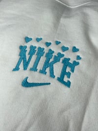Image 1 of NIKE BLUE HEARTS CREWNECK