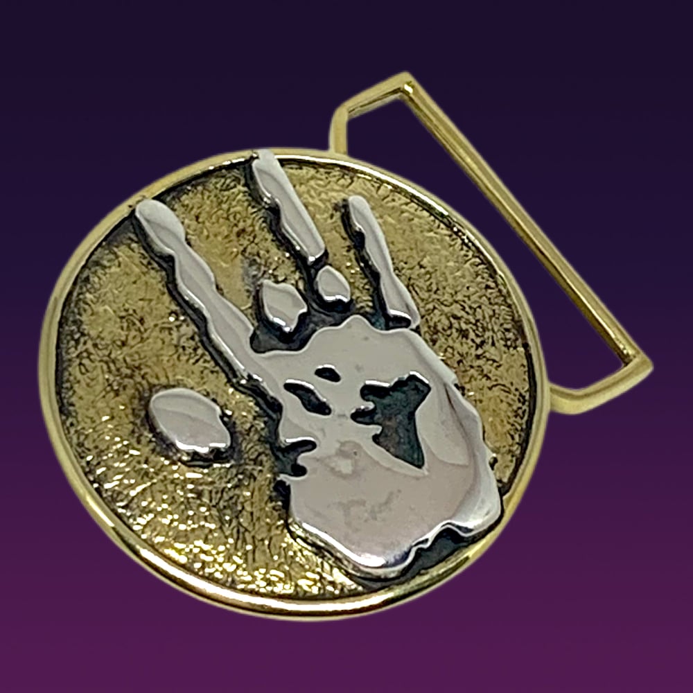 Image of Jerry Hand Print Belt buckle cast in Yellow Brass and Sterling Silver