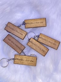 Image 1 of Manifest Keychains 