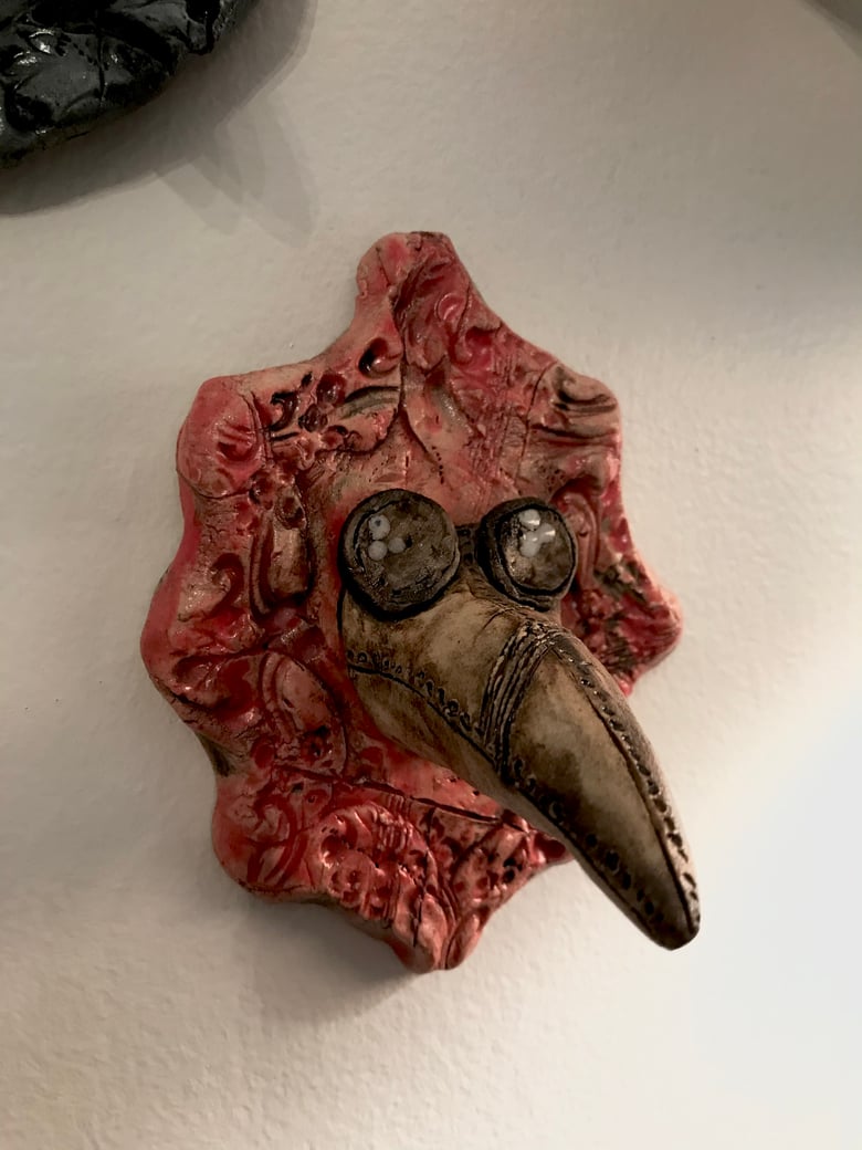 Image of Plague mask on frame II