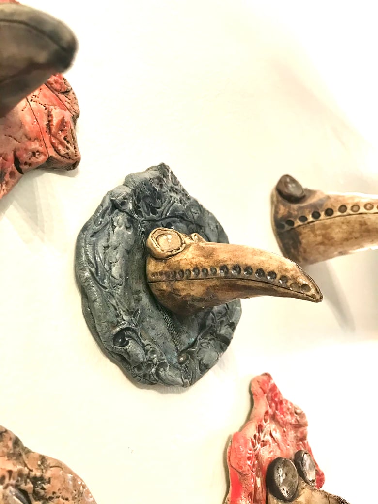 Image of Plague mask on frame III