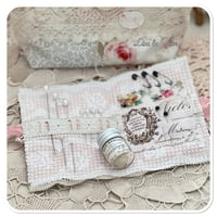 Image 3 of sewing zipper purse and needle book and tiny glass bottle of vintage buttons