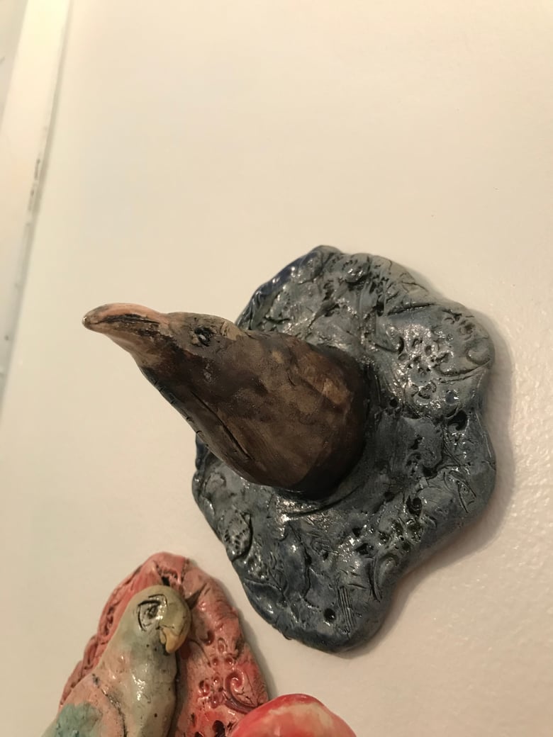 Image of Raven in a frame