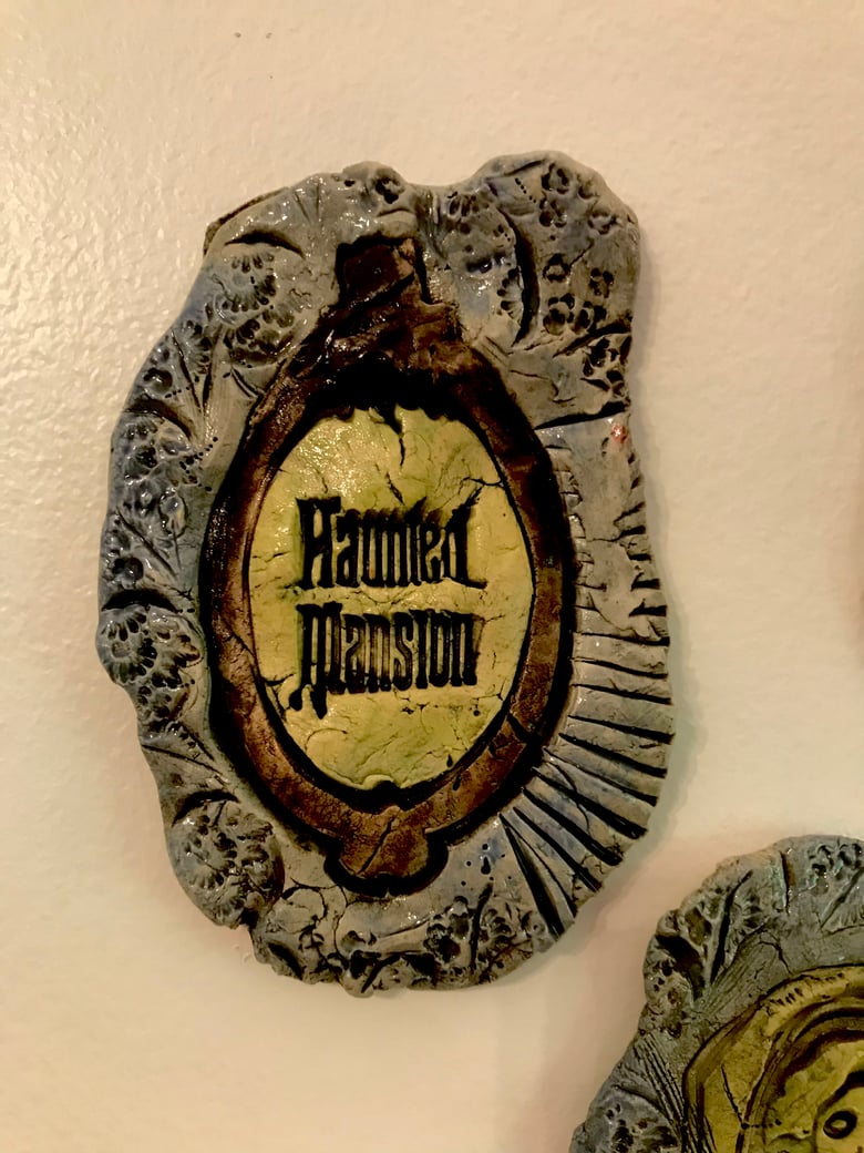 Image of Haunted Mansion frame up tile
