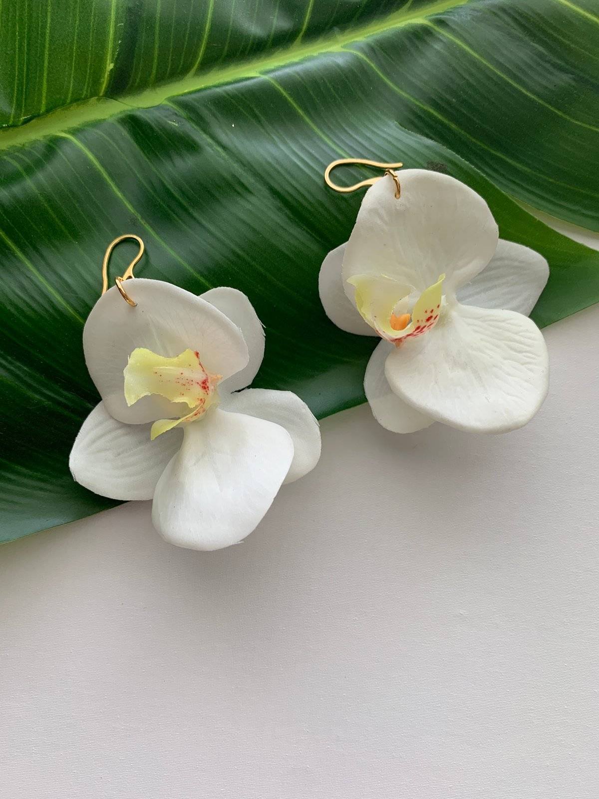 white orchid earrings