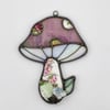 Iridescent Pink Mushroom suncatcher.