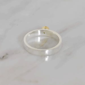 Image of Natural Peridot round cut 18k gold plated x silver band ring
