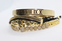 Set de 4 pulseras oro