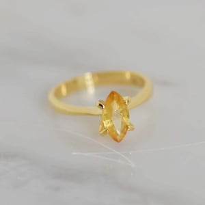 Image of Sri Lanka Honey Yellow Sapphire marquise cut 14k gold 4 claws ring