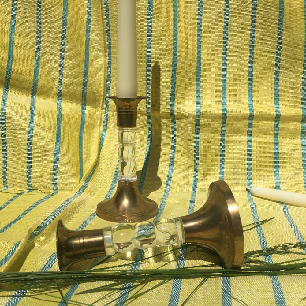 Image of  lucite and brass candlesticks 