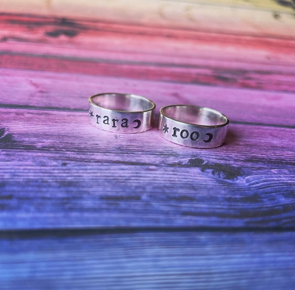 Personalised silver name ring with star and moon. Celestial silver 925 stamped word ring.