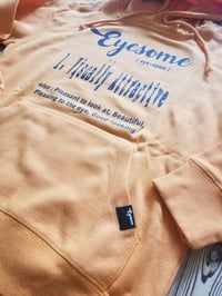 Image 2 of EYESOME - VISUALLY ATTRACTIVE (definition) TANGERINE Hoodie