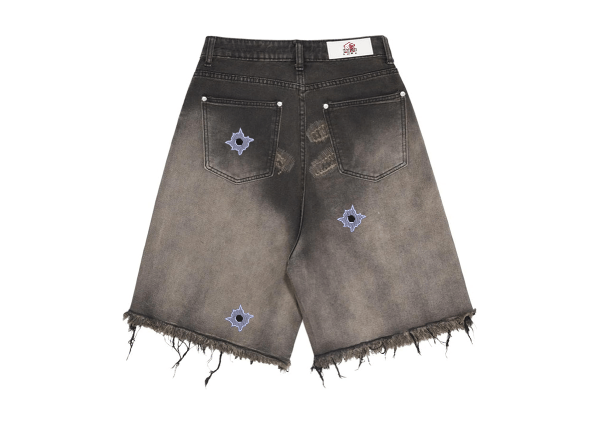 Image of DISTRESSED BULLET HOLE DENIM SHORTS